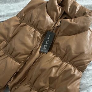 Cropped puffer faux leather vest
